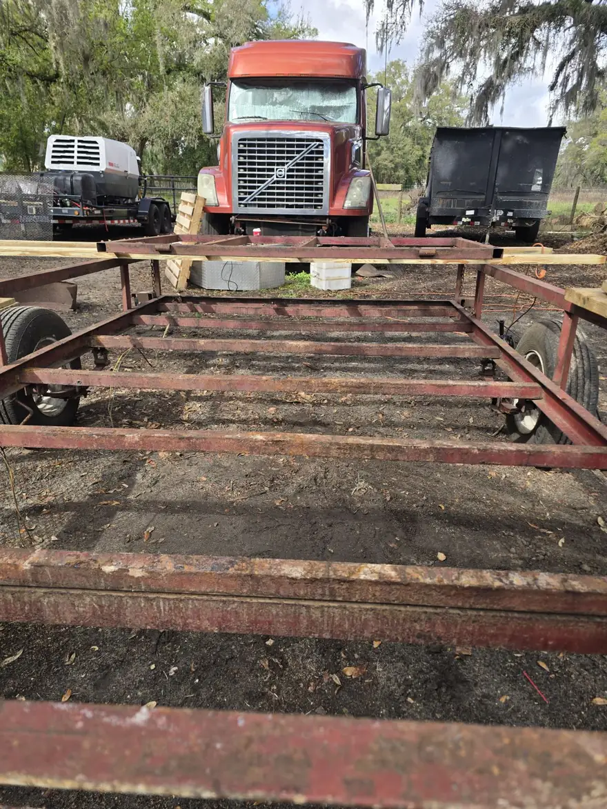 Corroded, rusted trailer frame before blasting